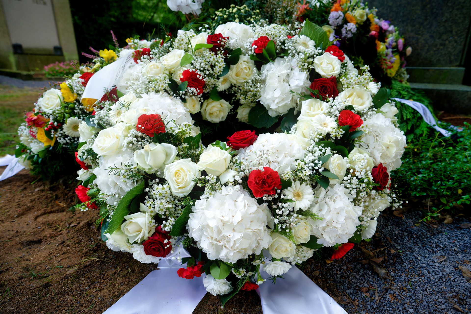 Representative white funeral wreath